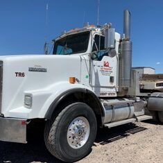 D&O Crane Kenworth heavy haul truck parked in the company yard in Northern Arizona